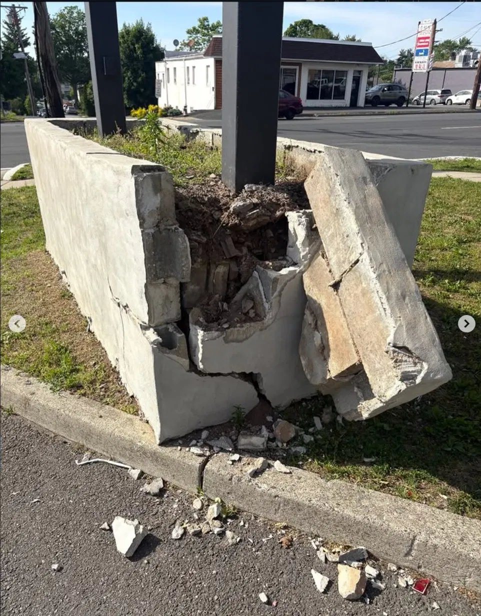 Impact damage — shattered CMU block and exposed core fill