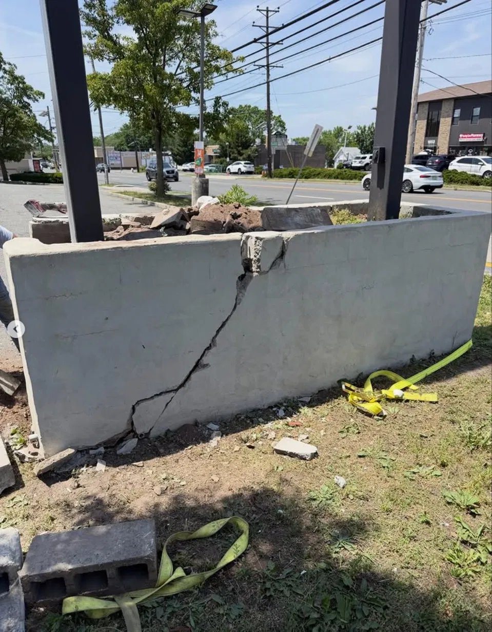 Structural crack running through the adjacent base wall