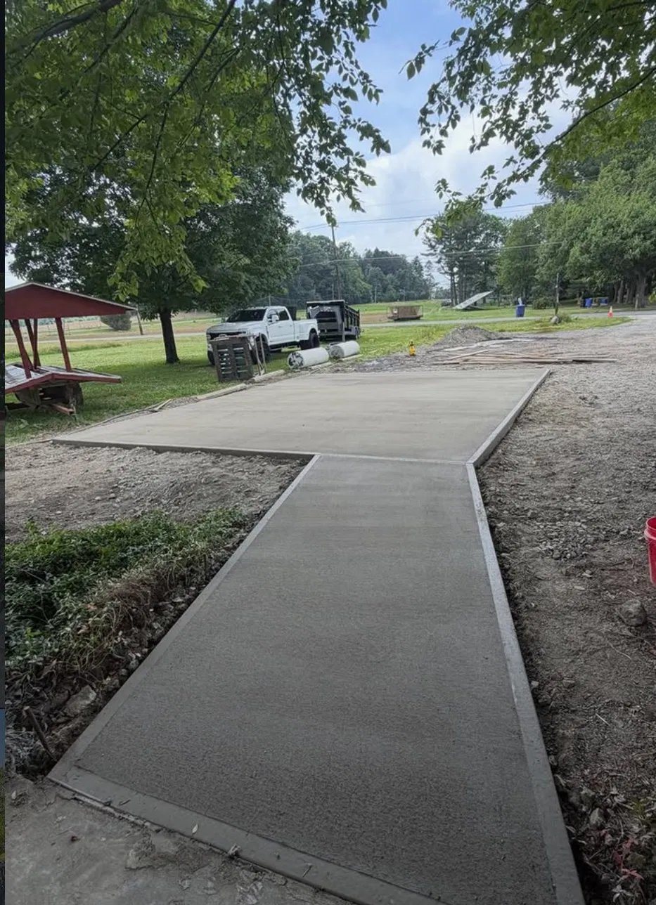 New concrete sidewalk and ADA parking pad poured at Hlubik Farms NJ