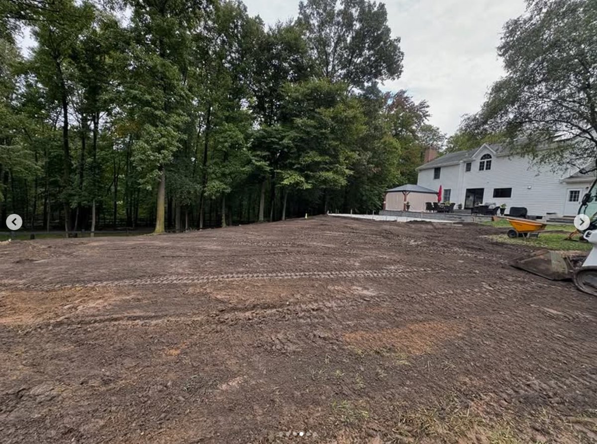 Shaping the new grade with the skid steer