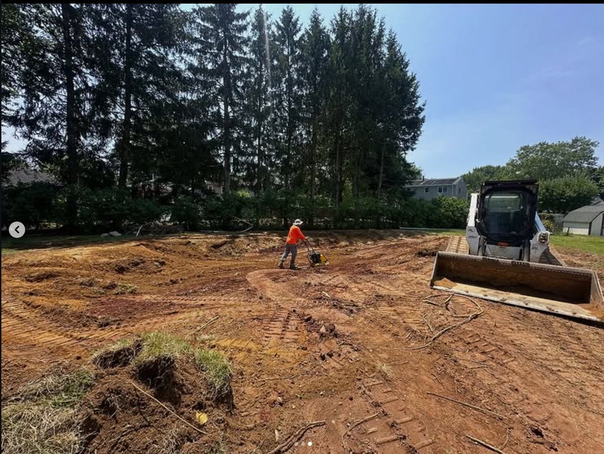 Graded and compacted — the cavity restored and ready for topsoil and seed